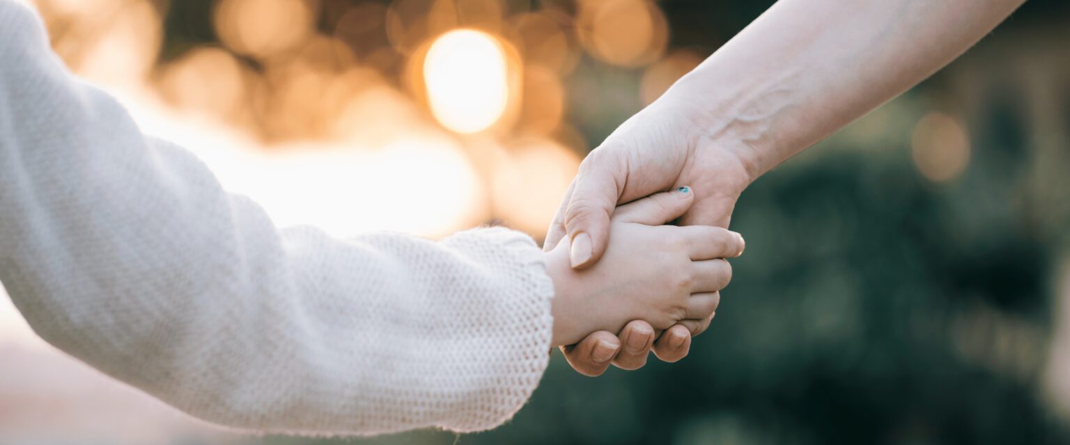 beautiful-scene-with-mother-holding-childs-hand